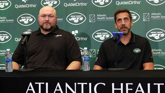 FLORHAM PARK, NEW JERSEY - APRIL 26: (L-R) New York Jets general manager Joe Douglas, quarterback Aaron Rodgers and head coach Robert Saleh attend a press conference at Atlantic Health Jets Training Center on April 26, 2023 in Florham Park, New Jersey.