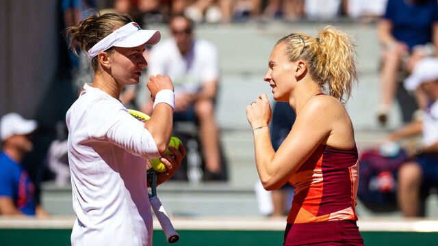 PARIS, FRANCE - MAY 31: Barbora Krejcikova of the Czech Republic and Katerina Siniakova of the Czech Republic in action against Eri Hozumi of Japan and Ulrikke Eikeri of Norway in action during the first round of doubles on Day Four of Roland Garros on May 31, 2023 in Paris, France