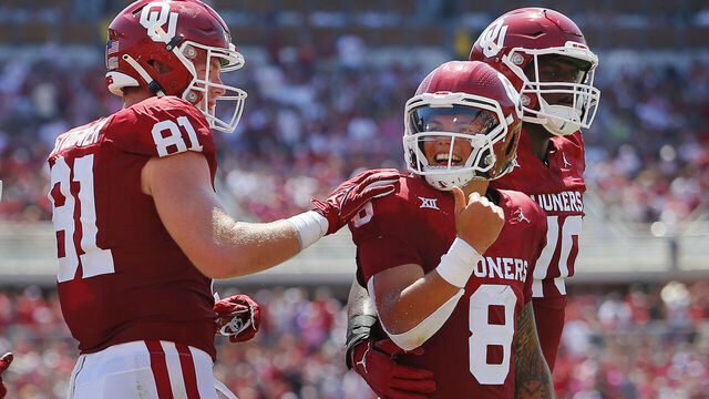 NORMAN, OKLAHOMA - SEPTEMBER 2: Tight end Austin Stogner #81 congratulates quarterback Dillon Gabriel #8 of the Oklahoma Sooners on his 5-yard touchdown run against the Arkansas State Red Wolves in the second quarter at Gaylord Family Oklahoma Memorial Stadium on September 2, 2023 in Norman, Oklahoma. Oklahoma leads 45-0 at the half.
