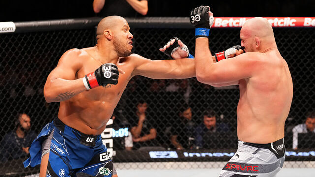 PARIS, FRANCE - SEPTEMBER 02: (L-R) Ciryl Gane of France punches Serghei Spivac of Moldova in a heavyweight fight during the UFC Fight Night event at The Accor Arena on September 02, 2023 in Paris, France.