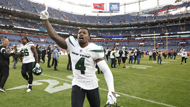 DENVER, COLORADO - OCTOBER 23: D.J. Reed #4 of the New York Jets celebrates following a game between the Denver Broncos and the New York Jets at Empower Field At Mile High on October 23, 2022 in Denver, Colorado.