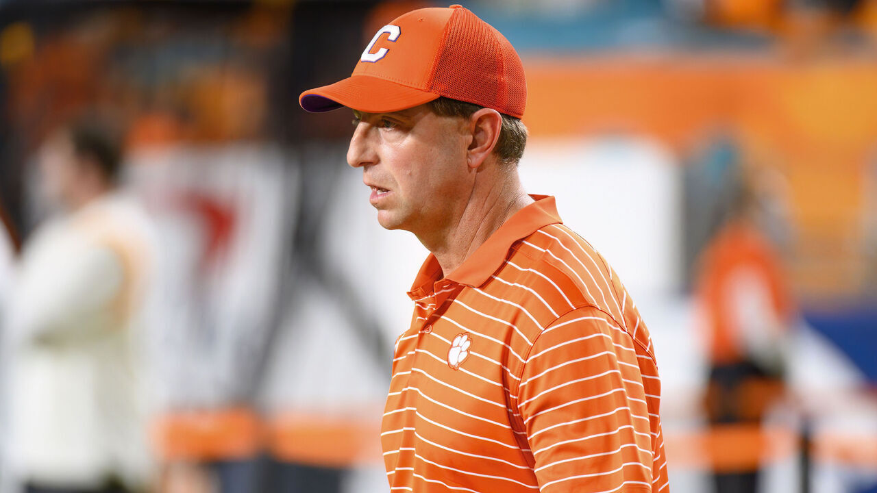 MIAMI GARDENS, FL - DECEMBER 30: Clemson head coach Dabo Swinney watches the players on the field before the Capital One Orange Bowl college football game between the Tennessee Volunteers and the Clemson Tigers on December 30, 2022 at the Hard Rock Stadium in Miami Gardens, FL.
