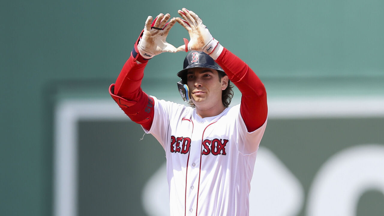 Boston, MA - August 27: Boston Red Sox 1B Triston Casas gestures to his dugout after hitting a first inning double. The Red Sox lost to the Los Angeles Dodgers, 7-4.