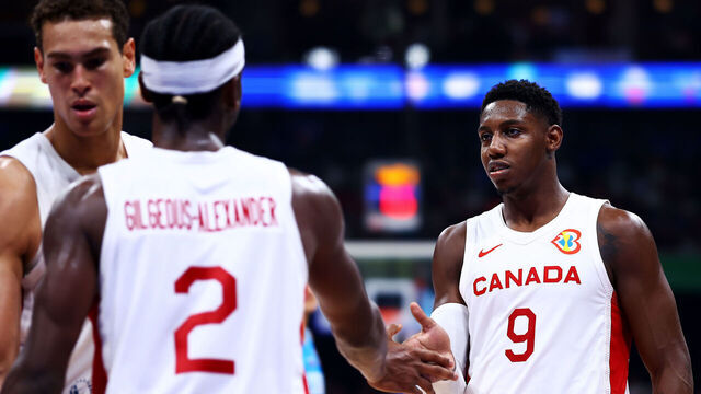 MANILA, PHILIPPINES - SEPTEMBER 06: RJ Barrett #9 of Canada celebrates with Shai Gilgeous-Alexander #2 (C) after a play in the third quarter during the FIBA Basketball World Cup quarterfinal game against Slovenia at Mall of Asia Arena on September 06, 2023 in Manila, Philippines.