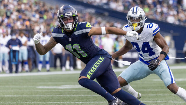 SEATTLE, WASHINGTON - AUGUST 19: Jaxon Smith-Njigba #11 of the Seattle Seahawks runs a route against the Dallas Cowboys during a preseason game at Lumen Field on August 19, 2023 in Seattle, Washington.