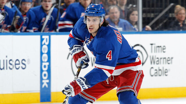 NEW YORK, NY - DECEMBER 20: Michael Del Zotto #4 of the New York Rangers skates against the New York Islanders at Madison Square Garden on December 20, 2013 in New York City. The New York Islanders won 5-3.