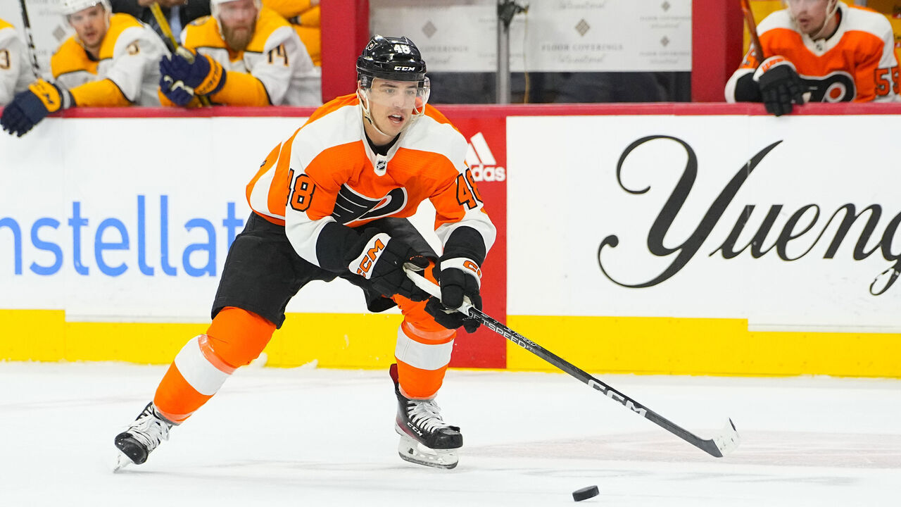 PHILADELPHIA, PA - FEBRUARY 11: Philadelphia Flyers Center Morgan Frost (48) controls the puck during the second period of the National Hockey League game between the Nashville Predators and the Philadelphia Flyers on February 11, 2023, at the Wells Fargo Center in Philadelphia, PA.
