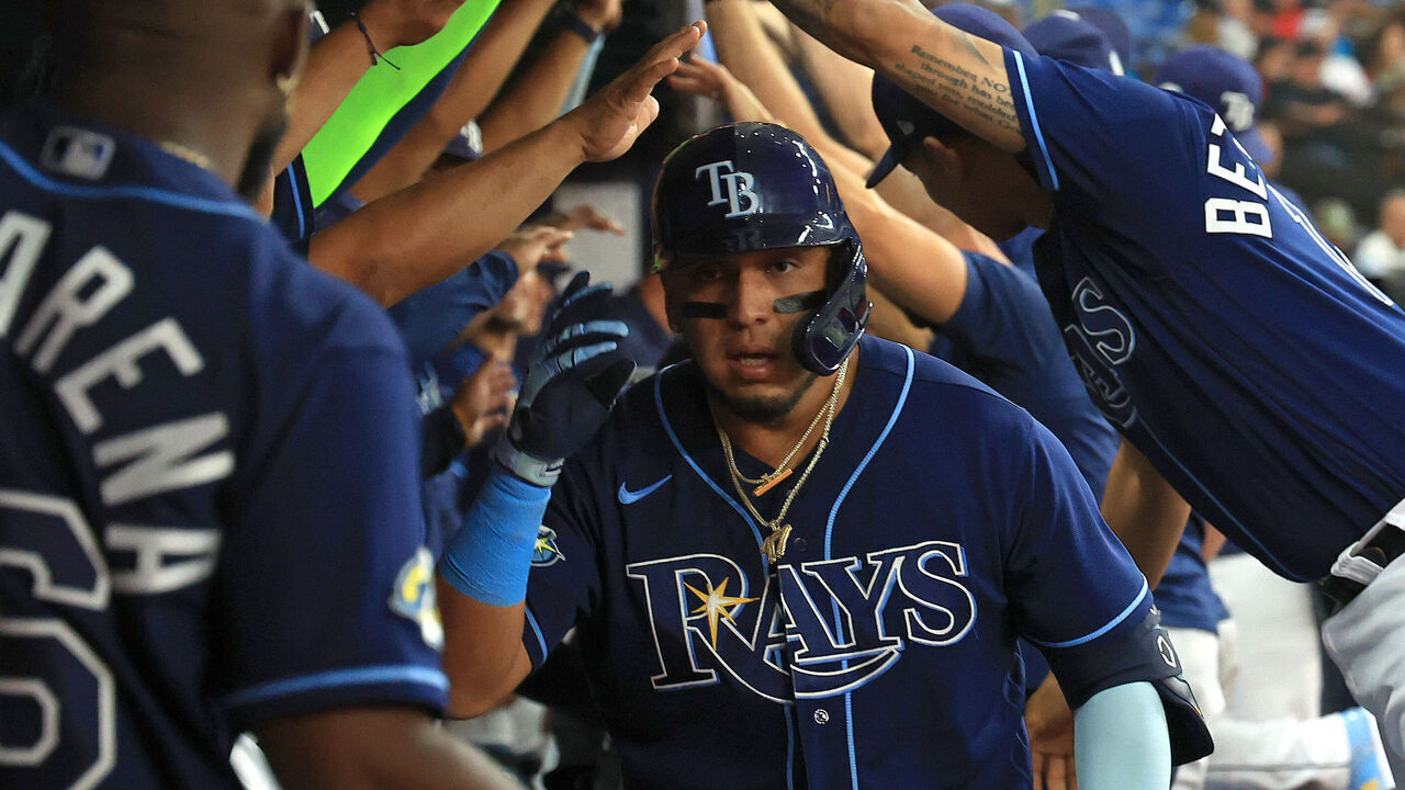 ST PETERSBURG, FLORIDA - SEPTEMBER 06: Isaac Paredes #17 of the Tampa Bay Rays is congratulated after hitting a home run in the fourth inning during a game against the Boston Red Sox at Tropicana Field on September 06, 2023 in St Petersburg, Florida.