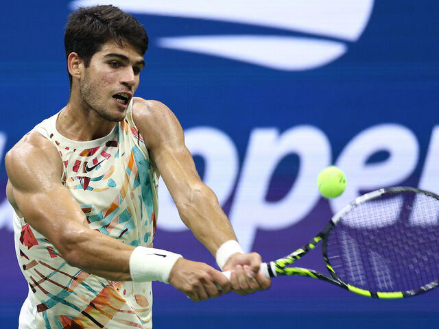 NEW YORK, NEW YORK - SEPTEMBER 06: Carlos Alcaraz of Spain returns a shot against Alexander Zverev of Germany during their Men's Singles Quarterfinal match on Day Ten of the 2023 US Open at the USTA Billie Jean King National Tennis Center on September 06, 2023 in the Flushing neighborhood of the Queens borough of New York City.