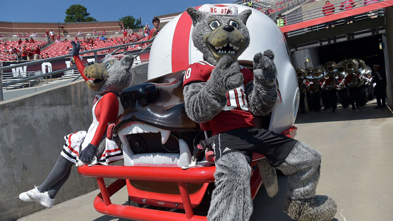 RALEIGH, NC - SEPTEMBER 01: North Carolina State Wolfpack mascots Miss Wuf and Mr. Wuf during their game against the James Madison Dukes at Carter-Finley Stadium on September 1, 2018 in Raleigh, North Carolina. North Carolina State won 24-13.
