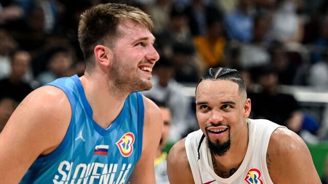 Canada's Dillon Brooks (R) and Slovenia's Luka Doncic react during the FIBA Basketball World Cup quarter-final match between Canada and Slovenia at the Mall of Asia Arena in Manila on September 6, 2023.