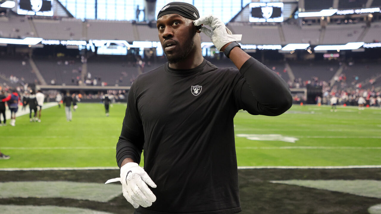 LAS VEGAS, NEVADA - DECEMBER 18: Defensive end Chandler Jones #55 of the Las Vegas Raiders talks to fans before a game against the New England Patriots at Allegiant Stadium on December 18, 2022 in Las Vegas, Nevada. The Raiders defeated the Patriots 30-24.