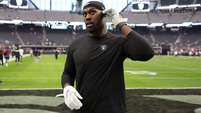LAS VEGAS, NEVADA - DECEMBER 18: Defensive end Chandler Jones #55 of the Las Vegas Raiders talks to fans before a game against the New England Patriots at Allegiant Stadium on December 18, 2022 in Las Vegas, Nevada. The Raiders defeated the Patriots 30-24.