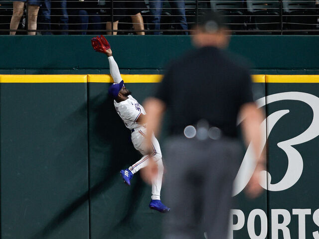 Rangers All-Star Garcia leaves after coming down hard trying to