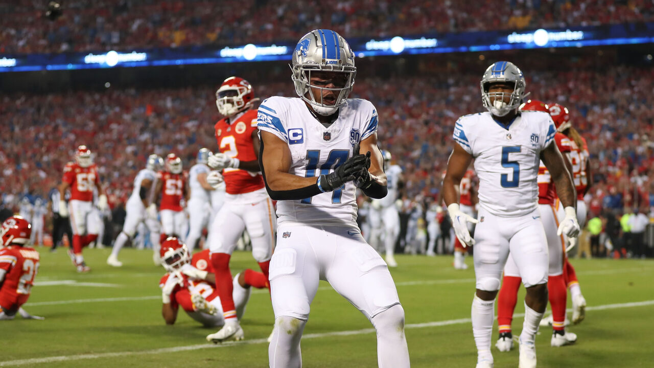 KANSAS CITY, MO - SEPTEMBER 07: Detroit Lions wide receiver Amon-Ra St. Brown (14) celebrates a 9-yard touchdown reception in the first quarter of an NFL game between the Detroit Lions and Kansas City Chiefs on Sep 7, 2023 at GEHA Field at Arrowhead Stadium in Kansas City, MO.