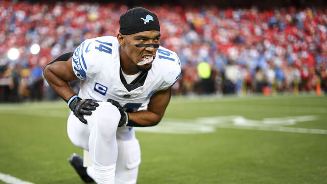 KANSAS CITY, MO - SEPTEMBER 7: Amon-Ra St. Brown #14 of the Detroit Lions stretches prior to an NFL football game against the Kansas City Chiefs at GEHA Field at Arrowhead Stadium on September 7, 2023 in Kansas City, Missouri.