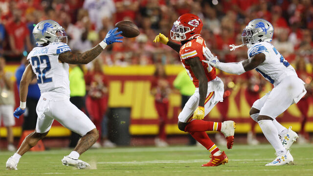 KANSAS CITY, MISSOURI - SEPTEMBER 07: Brian Branch #32 of the Detroit Lions intercepts a pass intended for Kadarius Toney #19 of the Kansas City Chiefs for a touchdown in the third quarter at GEHA Field at Arrowhead Stadium on September 07, 2023 in Kansas City, Missouri.