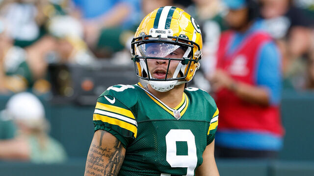 GREEN BAY, WISCONSIN - AUGUST 19: Christian Watson #9 of the Green Bay Packers warms up before the preseason game against the New England Patriots at Lambeau Field on August 19, 2023 in Green Bay, Wisconsin.