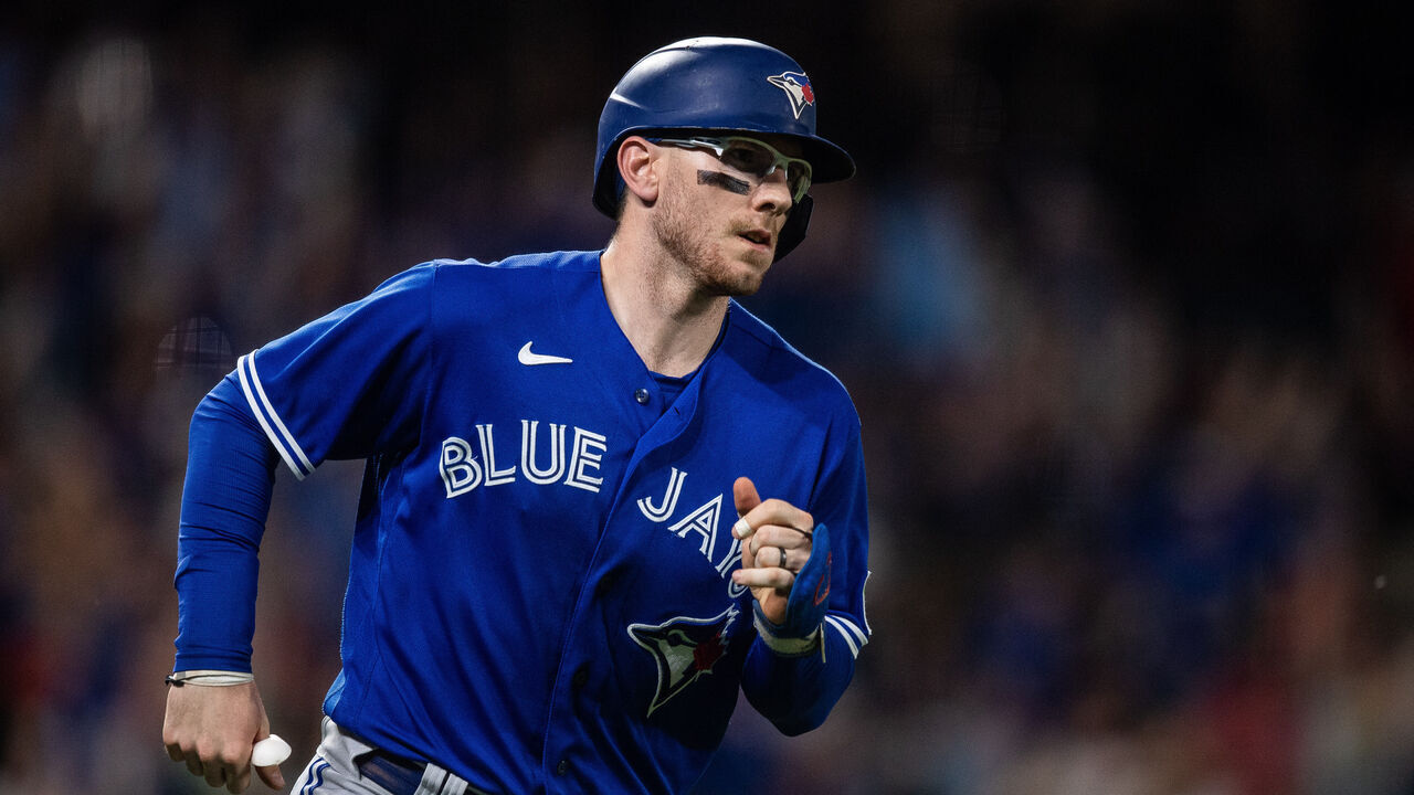 DENVER, CO - SEPTEMBER 1: Danny Jansen #9 of the Toronto Blue Jays runs after hitting a two run home run in the sixth inning against the Colorado Rockies at Coors Field on September 1, 2023 in Denver, Colorado.
