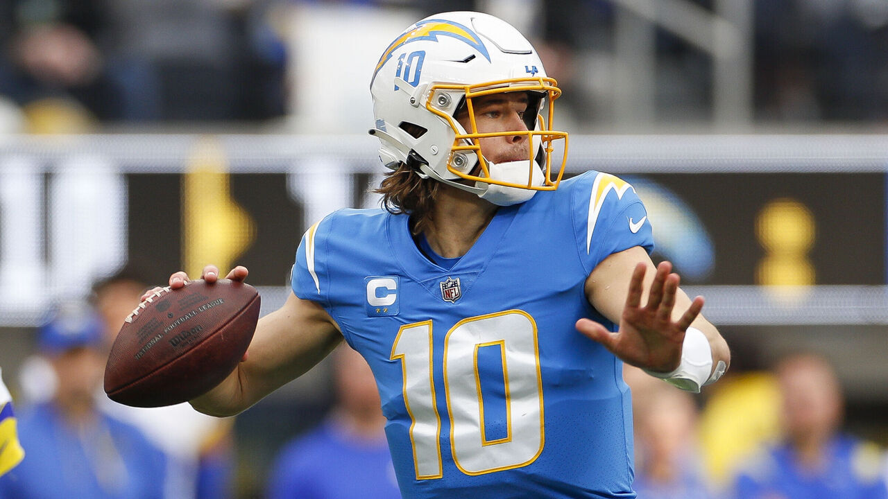 INGLEWOOD, CA - JANUARY 01: Los Angeles Chargers quarterback Justin Herbert (10) passes the ball during an NFL regular season game between the Los Angeles Rams and the Los Angeles Chargers on January 01, 2023, at SoFi Stadium in Inglewood, CA.
