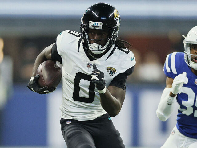 INDIANAPOLIS, INDIANA - SEPTEMBER 10: Calvin Ridley #0 of the Jacksonville Jaguars runs the ball up the field against Darrell Baker Jr. #39 of the Indianapolis Colts in the second quarter of a game at Lucas Oil Stadium on September 10, 2023 in Indianapolis, Indiana.