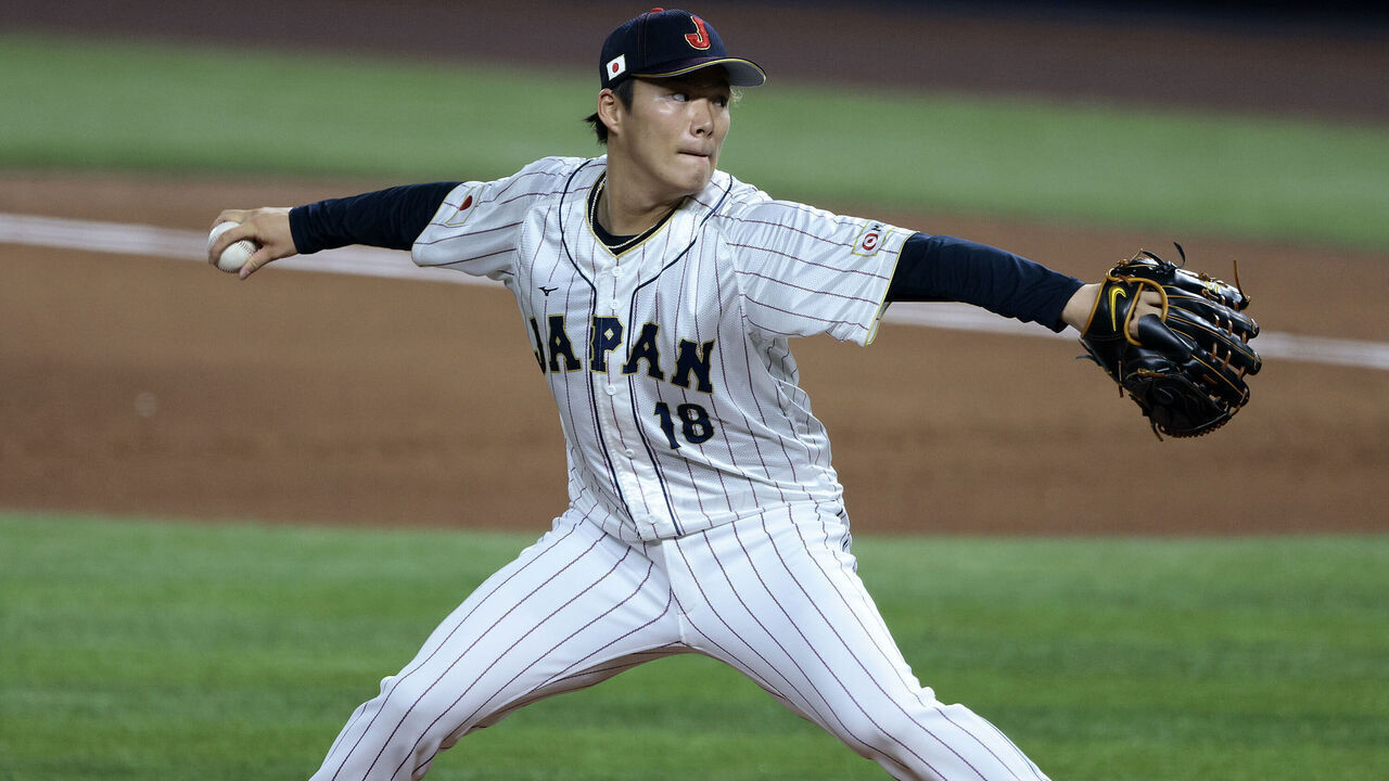 MIAMI, FL - MARCH 20: Yoshinobu Yamamoto #18 of Team Japan pitches during the 2023 World Baseball Classic Semifinal game against Team Mexico at loanDepot Park on Monday, March 20, 2023 in Miami, Florida.