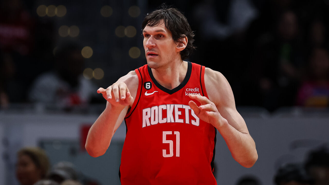 WASHINGTON, DC - APRIL 09: Boban Marjanovic #51 of the Houston Rockets passes the ball against the Washington Wizards during the first half at Capital One Arena on April 9, 2023 in Washington, DC.