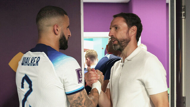 AL KHOR, QATAR - DECEMBER 04: Gareth Southgate, Head Coach of England, shakes hands with Kyle Walker of England in the tunnel following the FIFA World Cup Qatar 2022 Round of 16 match between England and Senegal at Al Bayt Stadium on December 04, 2022 in Al Khor, Qatar.