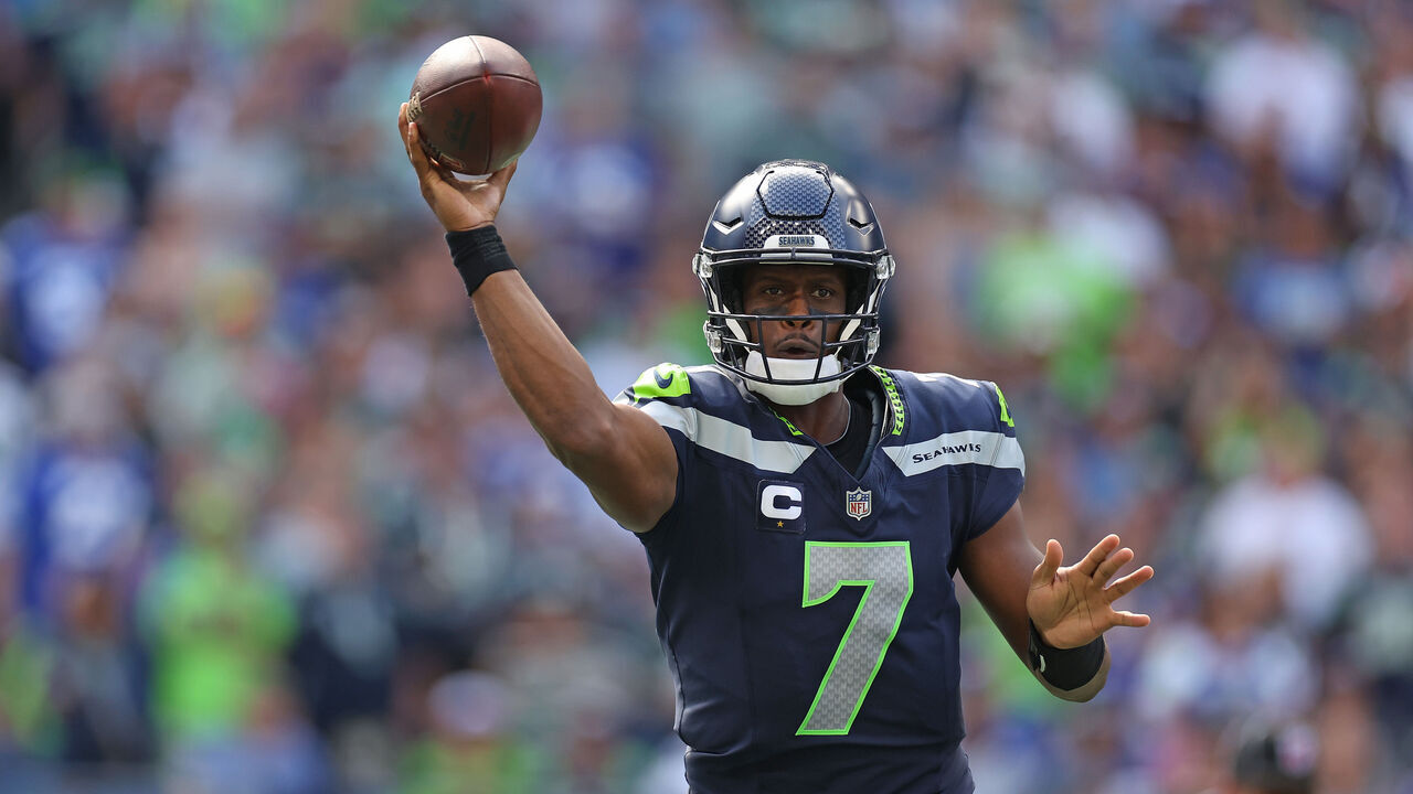 SEATTLE, WASHINGTON - SEPTEMBER 10: Geno Smith #7 of the Seattle Seahawks attempts a pass against the Los Angeles Rams during the second half at Lumen Field on September 10, 2023 in Seattle, Washington.