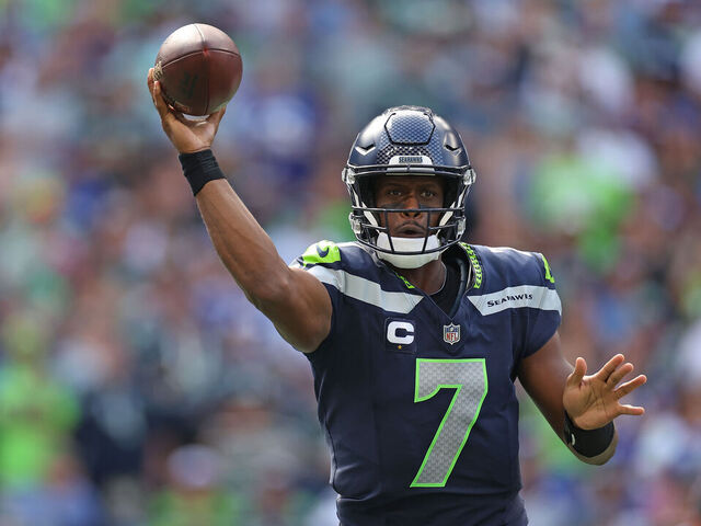 SEATTLE, WASHINGTON - SEPTEMBER 10: Geno Smith #7 of the Seattle Seahawks attempts a pass against the Los Angeles Rams during the second half at Lumen Field on September 10, 2023 in Seattle, Washington.