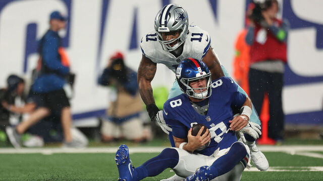 EAST RUTHERFORD, NEW JERSEY - SEPTEMBER 10: Micah Parsons #11 of the Dallas Cowboys sacks Daniel Jones #8 of the New York Giants during the first quarter at MetLife Stadium on September 10, 2023 in East Rutherford, New Jersey.