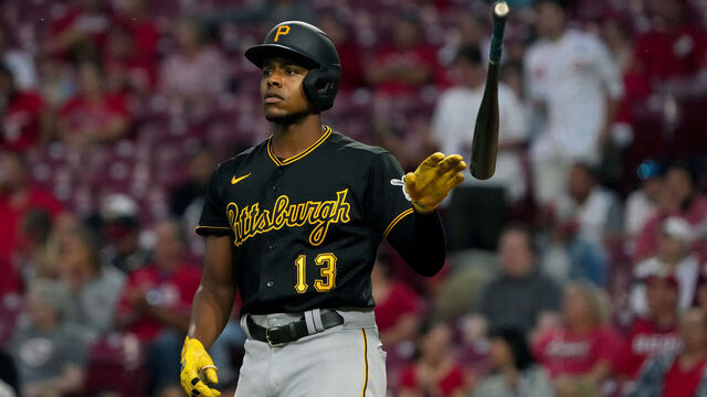 CINCINNATI, OHIO - SEPTEMBER 12: Ke'Bryan Hayes #13 of the Pittsburgh Pirates reacts after striking out in the third inning against the Cincinnati Reds at Great American Ball Park on September 12, 2022 in Cincinnati, Ohio.