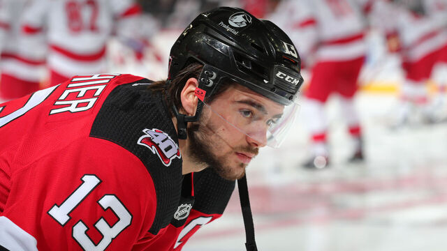 NEWARK, NJ - MAY 01: Nico Hischier #13 of the New Jersey Devils warms up prior to Game Three of the Second Round of the 2023 Stanley Cup Playoffs against the Carolina Hurricanes at the Prudential Center on May 7, 2023 in Newark, New Jersey.