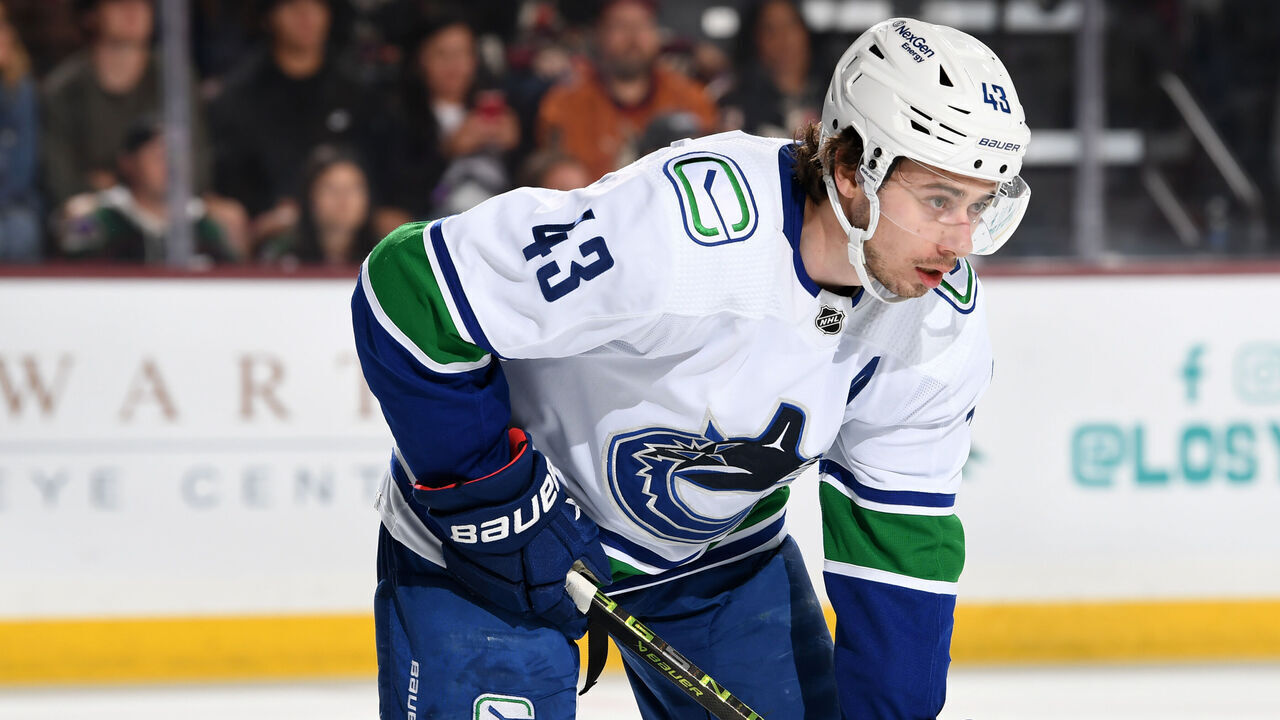 TEMPE, ARIZONA - APRIL 13: Quinn Hughes #43 of the Vancouver Canucks gets ready during a face off against the Arizona Coyotes at Mullett Arena on April 13, 2023 in Tempe, Arizona.