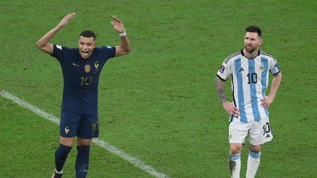 LUSAIL CITY, QATAR - DECEMBER 18: Kylian Mbappe of France (L) and Lionel Messi of Argentina during the FIFA World Cup Qatar 2022 Final match between Argentina and France at Lusail Stadium on December 18, 2022 in Lusail City, Qatar.