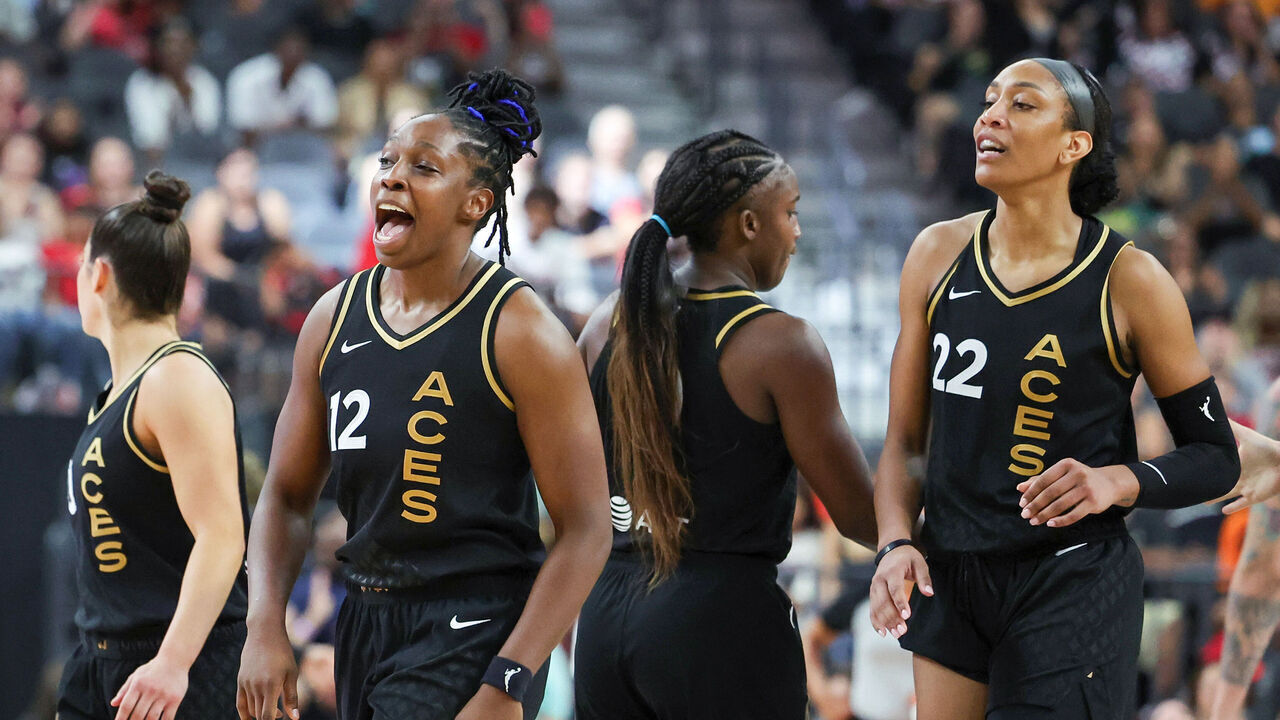 LAS VEGAS, NEVADA - SEPTEMBER 10: Kelsey Plum #10, Chelsea Gray #12, Jackie Young #0 and A'ja Wilson #22 of the Las Vegas Aces walk toward their bench during a timeout after Gray hit a 3-pointer against the Phoenix Mercury in the fourth quarter of their game at T-Mobile Arena on September 10, 2023 in Las Vegas, Nevada. The Aces defeated the Mercury 100-85.