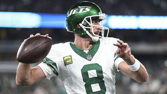EAST RUTHERFORD, NEW JERSEY - SEPTEMBER 11: Aaron Rodgers #8 of the New York Jets passes as he warms up prior to a game against the Buffalo Bills at MetLife Stadium on September 11, 2023 in East Rutherford, New Jersey.
