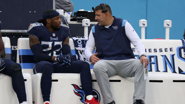 NASHVILLE, TN - DECEMBER 11: Tennessee Titans running back Derrick Henry (22) and Tennessee Titans head coach Mike Vrabel talk on the bench during a game between the Tennessee Titans and Jacksonville Jaguars, December 11, 2022, at Nissan Stadium in Nashville, Tennessee.