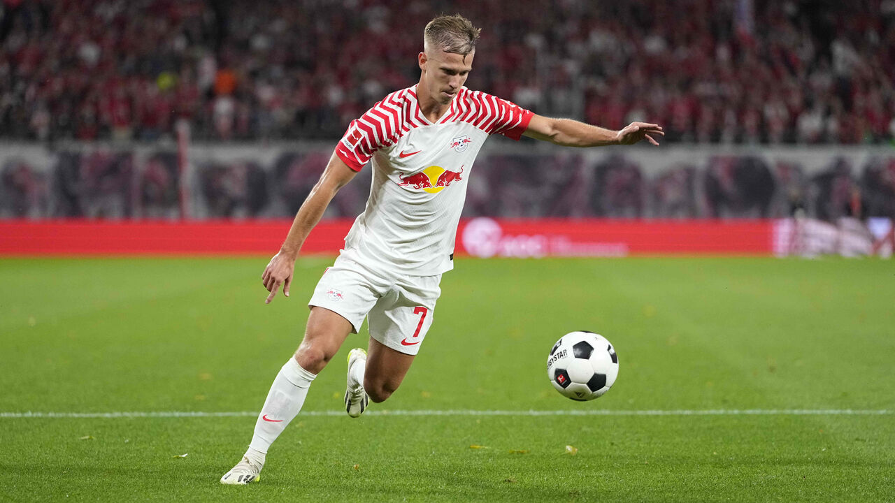 LEIPZIG, GERMANY - AUGUST 25: Dani Olmo of RB Leipzig controls the ball during the Bundesliga match between RB Leipzig and VfB Stuttgart at Red Bull Arena on August 25, 2023 in Leipzig, Germany.