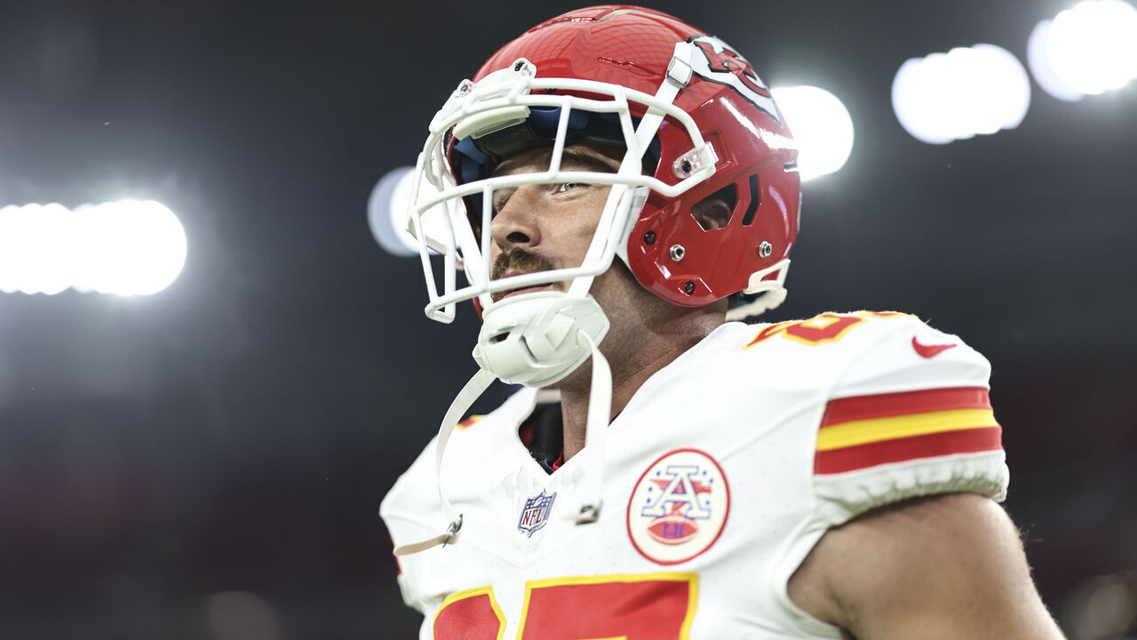 GLENDALE, ARIZONA - AUGUST 19: Travis Kelce #87 of the Kansas City Chiefs reacts as he warms up prior to an NFL preseason football game between the Arizona Cardinals and the Kansas City Chiefs at State Farm Stadium on August 19, 2023 in Glendale, Arizona.