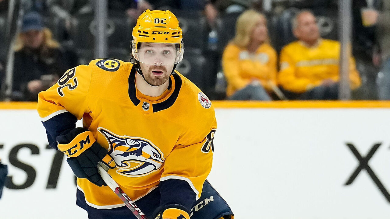 NASHVILLE, TENNESSEE - APRIL 6: Tommy Novak #82 of the Nashville Predators skates against the Carolina Hurricanes during an NHL game at Bridgestone Arena on April 6, 2023 in Nashville, Tennessee.