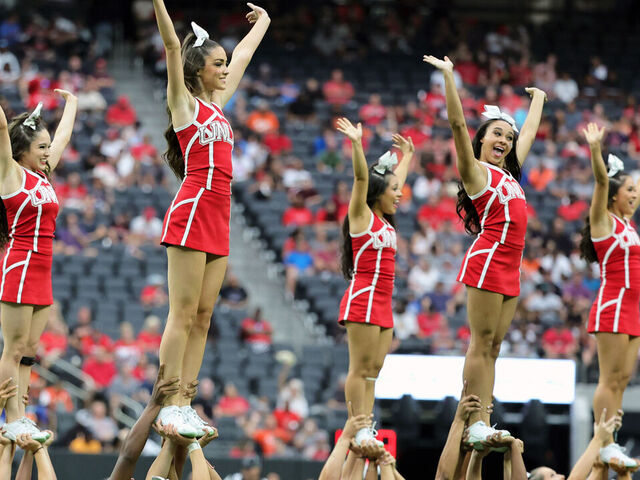 LAS VEGAS, NEVADA - AUGUST 27: UNLV Rebels cheerleaders perform during the team's game against the Idaho State Bengals at Allegiant Stadium on August 27, 2022 in Las Vegas, Nevada. The Rebels defeated the Bengals 52-21.