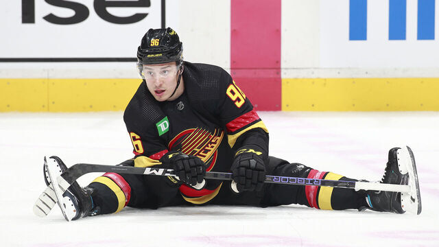 VANCOUVER, CANADA - APRIL 8: Andrei Kuzmenko #96 of the Vancouver Canucks stretches during their NHL game against the Calgary Flames at Rogers Arena April 8, 2023 in Vancouver, British Columbia, Canada.