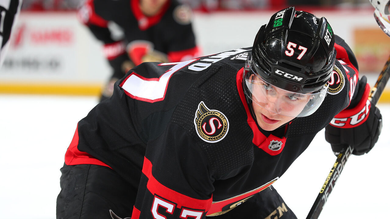NEWARK, NJ - MARCH 25: Shane Pinto #57 of the Ottawa Senators gets ready to take a faceoff in the second period of the game against the New Jersey Devils at the Prudential Center on March 25, 2023 in Newark, New Jersey.