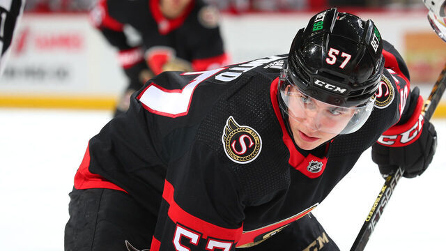 NEWARK, NJ - MARCH 25: Shane Pinto #57 of the Ottawa Senators gets ready to take a faceoff in the second period of the game against the New Jersey Devils at the Prudential Center on March 25, 2023 in Newark, New Jersey.