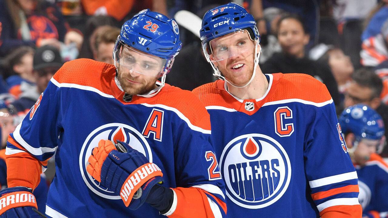 EDMONTON, CANADA - APRIL 01: Connor McDavid #97 and Leon Draisaitl #29 of the Edmonton Oilers have a conversation while awaiting a face-off during the game against the Anaheim Ducks on April 1, 2023 at Rogers Place in Edmonton, Alberta, Canada.
