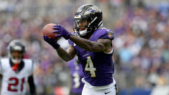 BALTIMORE, MD - SEPTEMBER 10: Ravens wide receiver/punt returner Zay Flowers (4) catches a deep pass during the first quarter during the Houston Texans versus Baltimore Ravens NFL game at M&T Bank Stadium on September 10, 2023 in Baltimore, MD.