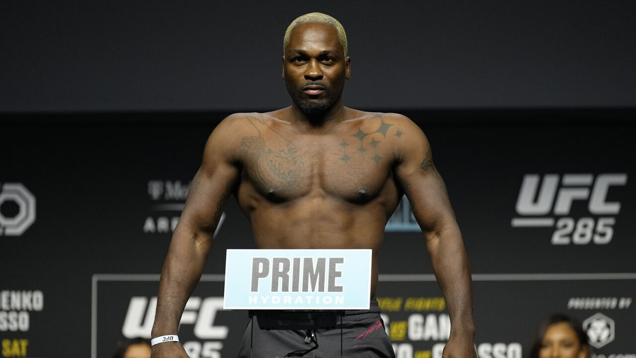 LAS VEGAS, NEVADA - MARCH 03: Derek Brunson poses on the scale during the UFC 285 ceremonial weigh-in at MGM Grand Garden Arena on March 03, 2023 in Las Vegas, Nevada.