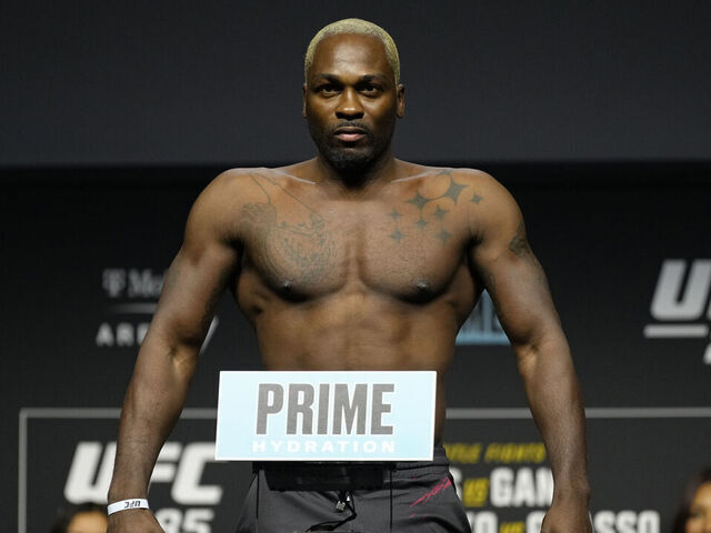 LAS VEGAS, NEVADA - MARCH 03: Derek Brunson poses on the scale during the UFC 285 ceremonial weigh-in at MGM Grand Garden Arena on March 03, 2023 in Las Vegas, Nevada.