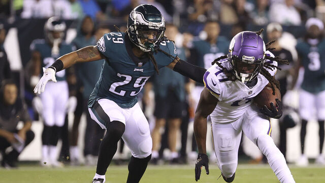 PHILADELPHIA, PENNSYLVANIA - SEPTEMBER 19: K.J. Osborn #17 of the Minnesota Vikings makes a reception past Avonte Maddox #29 of the Philadelphia Eagles at Lincoln Financial Field on September 19, 2022 in Philadelphia, Pennsylvania.